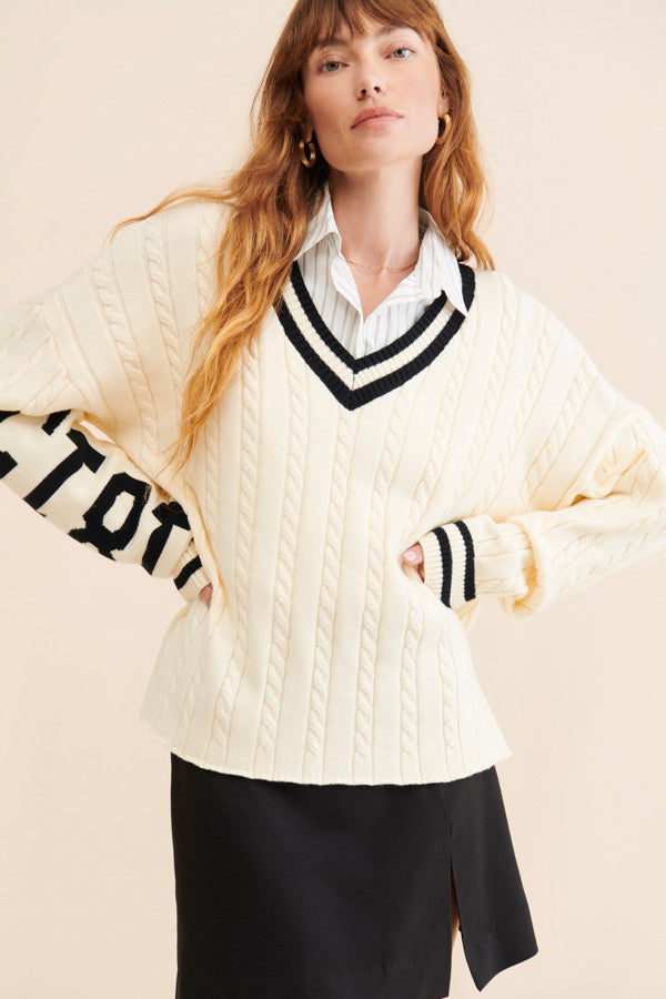 No Srcipt image - Images of 7 of 7 oversized v neck sweater, exaggerated long sleeve, cream cable knit, cream color with black accents, high-low hem length