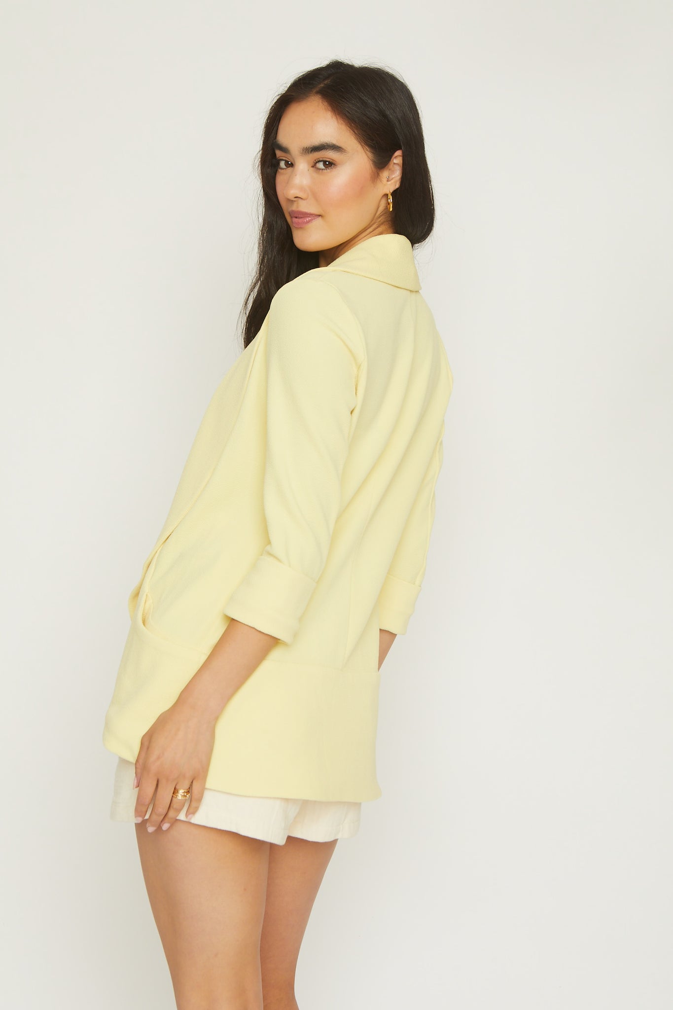 Melanie shawl knit jacket, crepe knit fabric, 3/4 sleeve length, shawl collar, open front, front pockets, stretch fabric, textured knit, lemon color