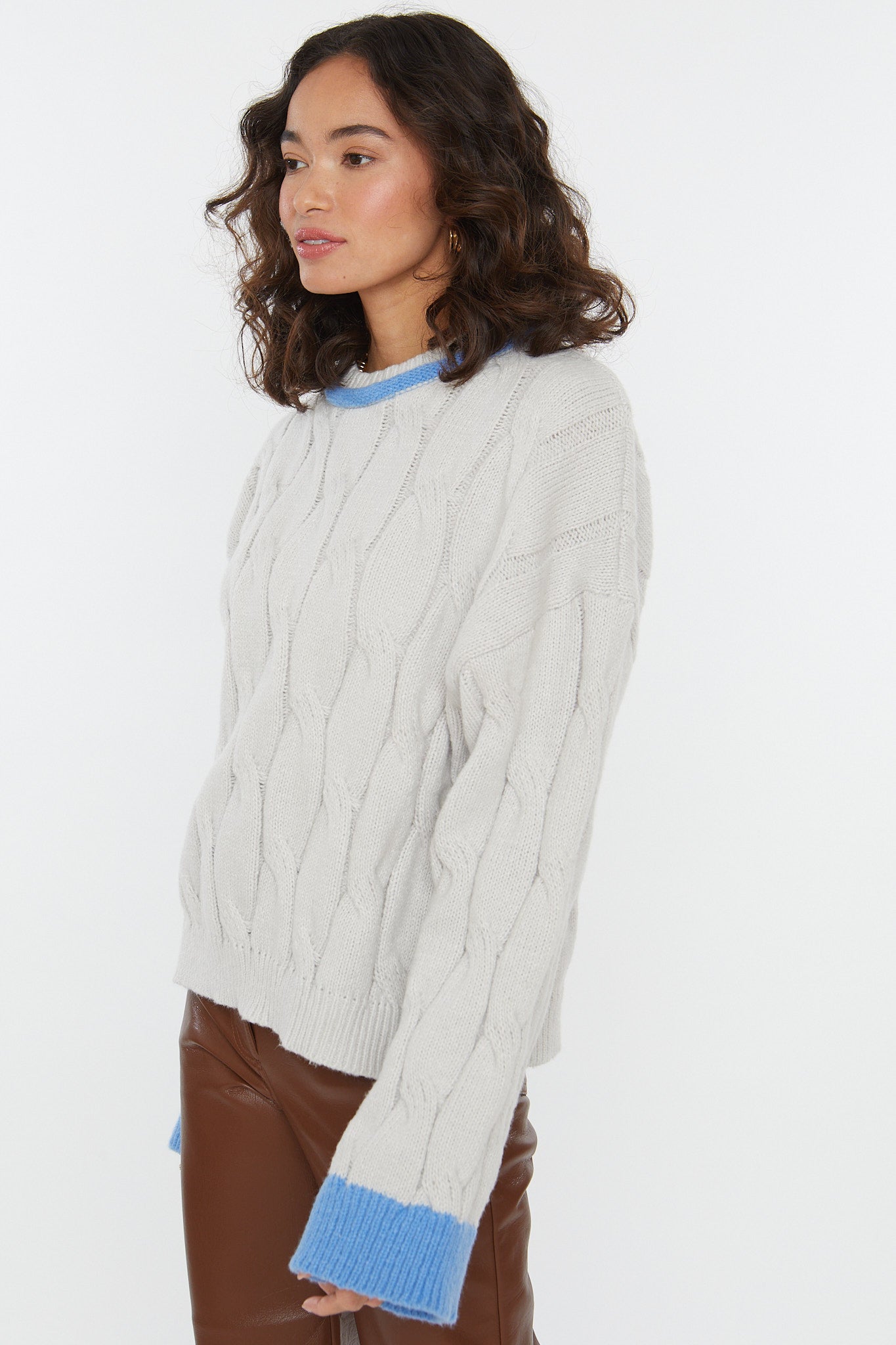 cable knit sweater, oversized sweater, light grey color with blue accent color details, cropped length